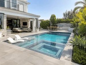 Space-efficient custom pool designed for a narrow coastal property